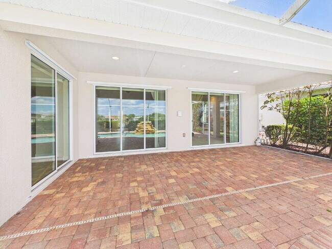 Building Photo - Luxury Lakefront Pool Home in Tesoro - Move-in Ready with Premium Inlcusions