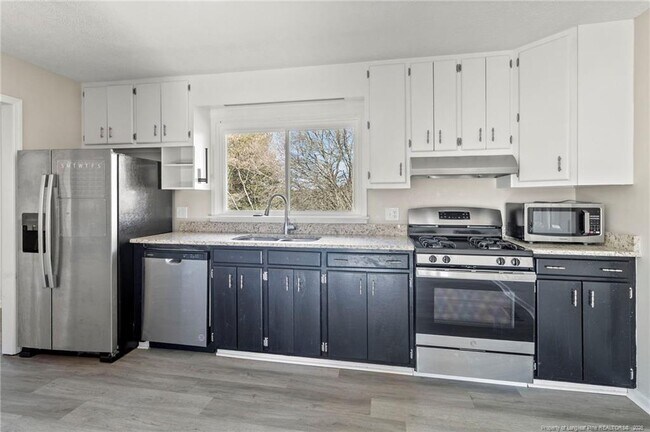 Building Photo - 5196 Remington Rd