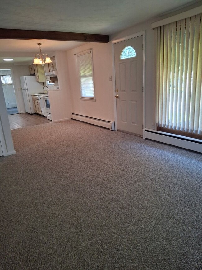 Building Photo - Charming 3-Bedroom Home with Backyard & Of...
