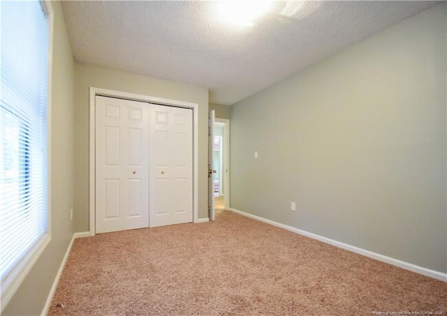 Building Photo - 6933 Woodmark Dr