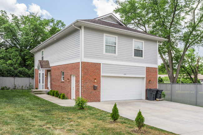 Exterior - Building with Private Garage - Regency Court Apartments