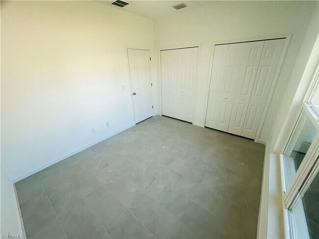 Building Photo - Brand-New 2BR/2BA Home with Lanai on Oversized Lot – Desirable SW Lehigh Acres