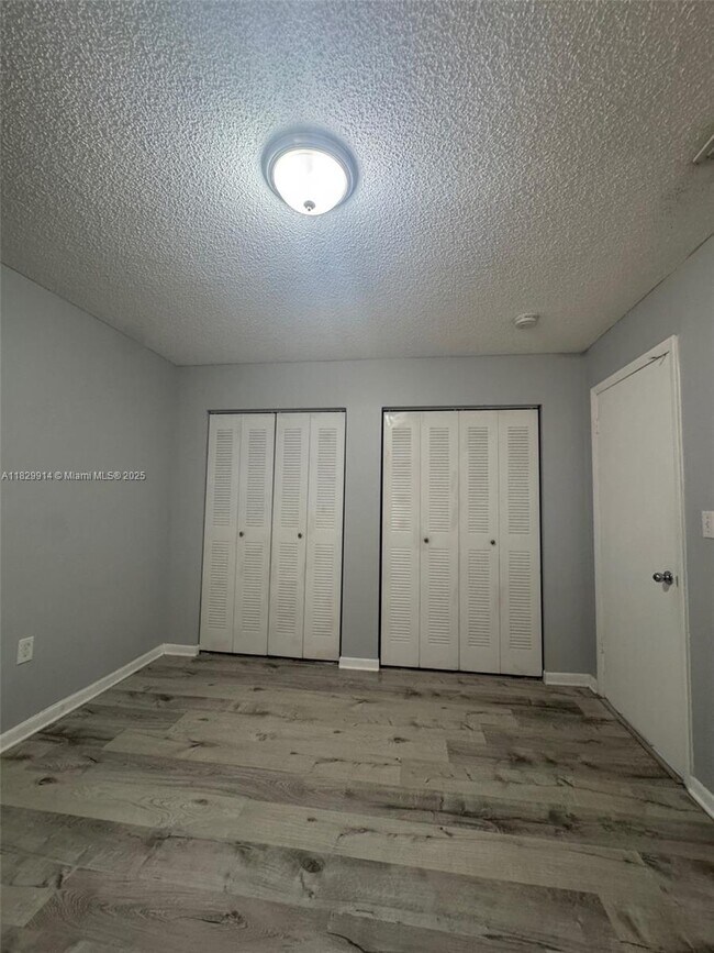 Building Photo - 7965 W 30th Ct