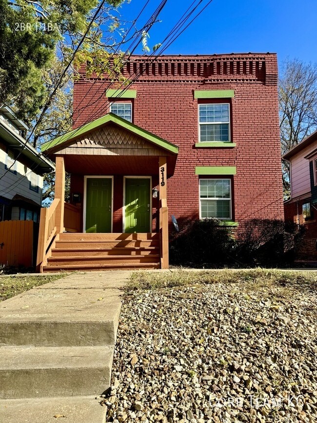 Building Photo - Top Floor of Duplex of the Year