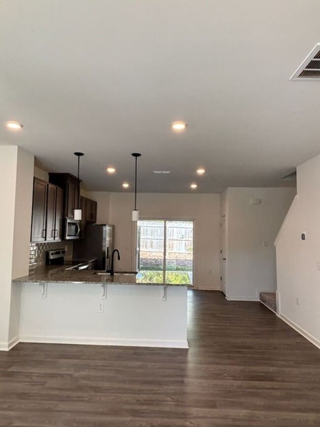 Building Photo - NEW LISTING ALERT!  Beautiful 2-Bedroom Townhome in Liberty Station – South Raleigh