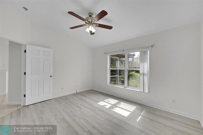 Building Photo - 5642 NW 118th Dr