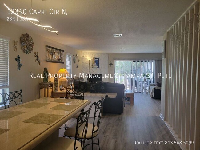 Building Photo - 12310 Capri Cir N