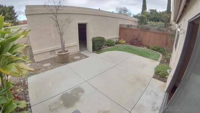 Back patio and yard - 6922 Pear Tree Dr
