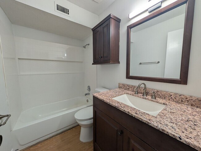 Building Photo - NOW AVAILABLE! Upgraded 3 Bedroom, 2 Bath Townhome with a Fenced yard, and close to NAS Jax and I...