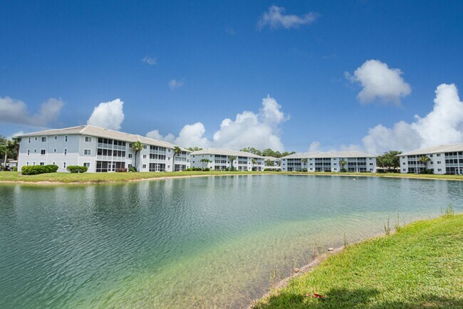Building Photo - AVAILABLE NOW! Top-Floor Condo | Gated Community | Preserve Views | Water, Sewer & Cable Included