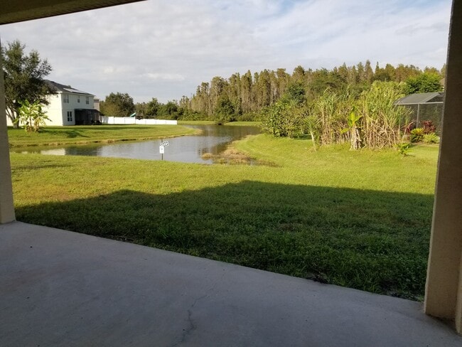 Building Photo - Lovely Four Bedroom with Pond View