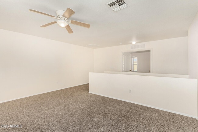 Building Photo - 15554 W Gelding Dr