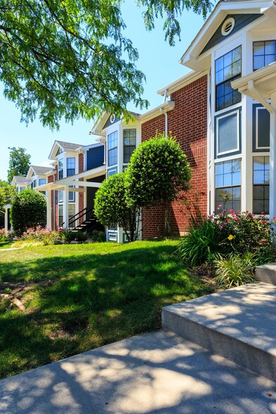 Beautiful Landscaping with Greenery and Flowers - Rolling Brook Village