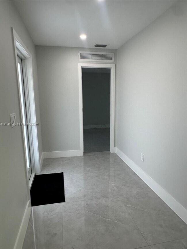Building Photo - 10790 SW 66th Dr