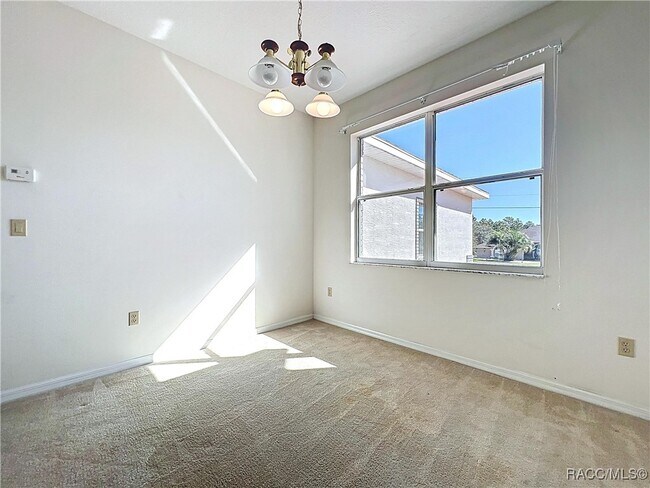 Building Photo - 5950 N Petunia Terrace