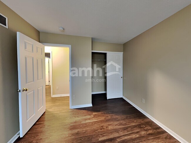 Building Photo - 6312 Satin Wood Dr