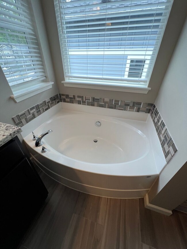 Building Photo - Quiet Luxury in a Forested Cul de Sac with...