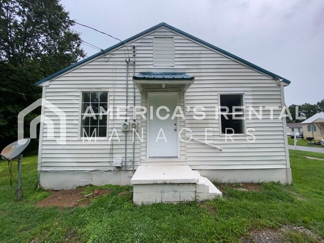 Building Photo - 104/105 7th Ave SE