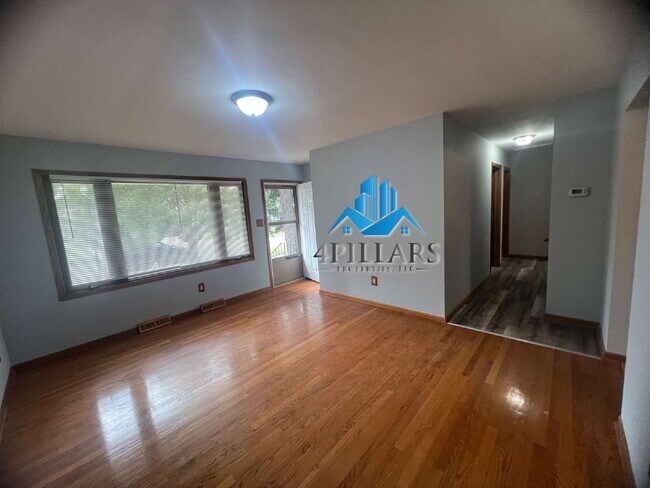 Building Photo - "Charming 3-Bedroom Haven with Finished Basement & Gleaming Hardwood Floors in Hammond!"
