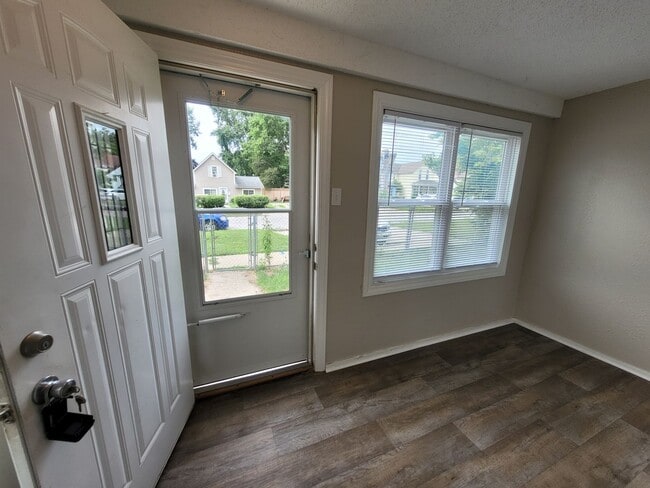 Building Photo - Two bedroom home with partially fenced yard!