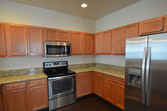 Building Photo - Beautiful townhome near Ft. Carson available to move in!