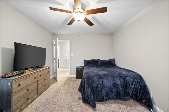 Building Photo - Stocked Pond, Walking Trails and More!!