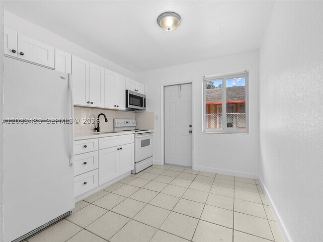 Building Photo - 1460 NW 52nd St
