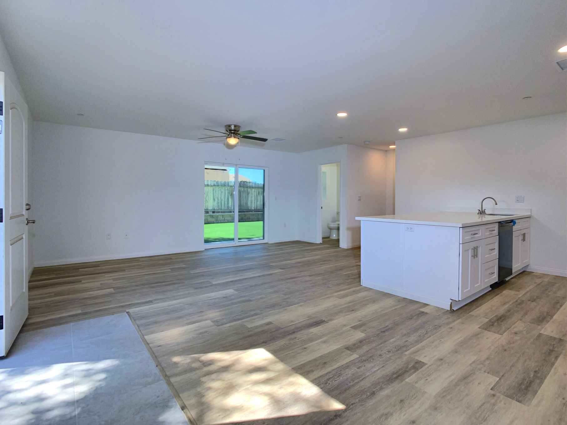 Spacious open floor plan on the 1st floor with half bath - 1051 Greenfield Dr