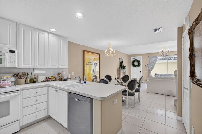 Building Photo - "Charming 4-Bedroom Townhouse Oasis on Barcelona Drive with 3 Full Baths – Spacious 1867 Sq. Ft. ...