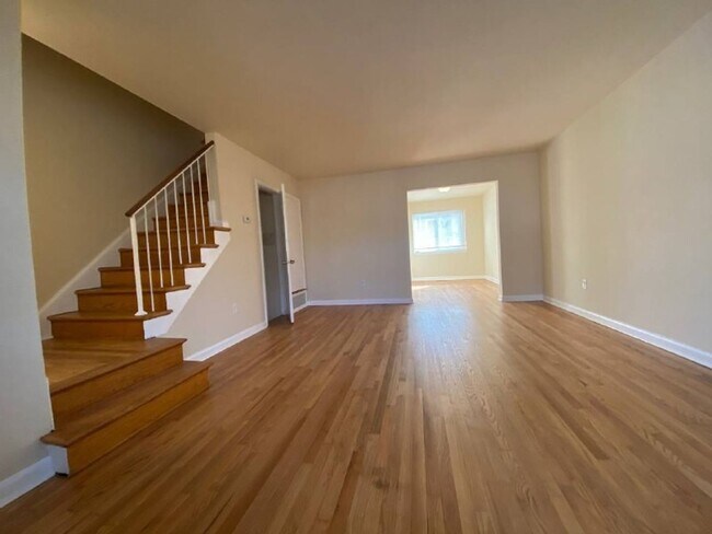 Building Photo - A spacious two bedroom, one and one half bath condo townhouse located in the northern section of ...