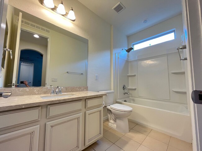 Building Photo - 4-bedroom, 4-bathroom home in the vibrant ...