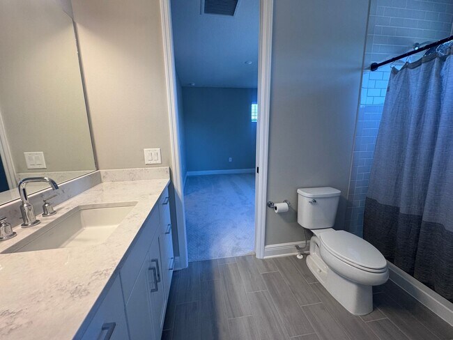 Building Photo - New Construction in Grand Park-4 Bedrooms and 4 Bathrooms with a Den and a Loft! No deposit for q...