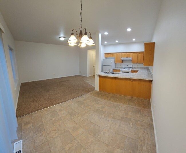 View into Living room & kitchen from diding area - 528 Fenton Ave