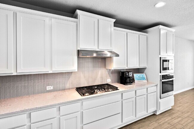 Building Photo - Rare Cibolo Canyons Opportunity | Guest Suite Downstairs, Optional 5th Bedroom, No Carpet, No Rea...
