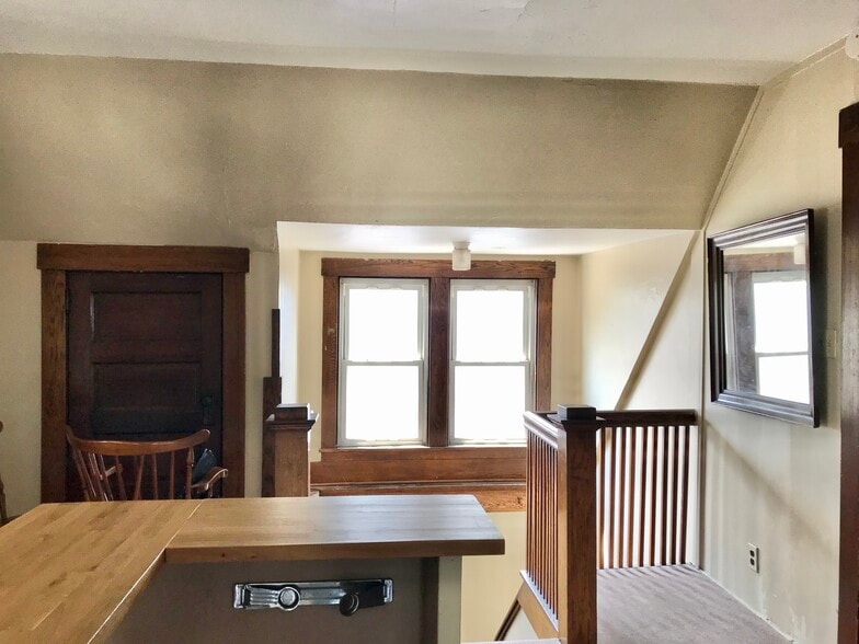 (looking toward entry stair) Great light from windows on three sides - 350 Cobun Avenue