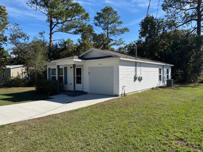 Building Photo - Cute Home Ready for Family