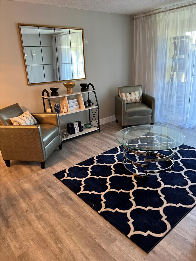 Building Photo - 9070 Lime Bay Blvd