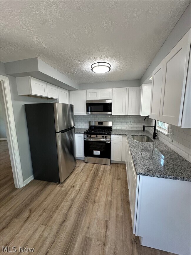 Building Photo - 18413 Waterbury Ave