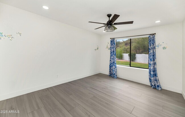 Building Photo - 1433 W Port Au Prince Ln