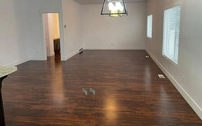Building Photo - Spacious 4-Bedroom Home with Finished Basement in Taylorsville