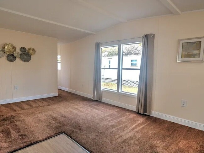 Building Photo - Beautifully Remodeled Lakefront Home | Spring-Fed Lake Views
