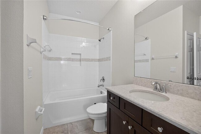 Building Photo - 8016 Marbella Crk Ave