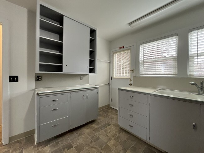 Building Photo - Expansive 4BR 2,900+ Sq Ft Home with Theater-Style Living Room & Bonus Hobby Workshop