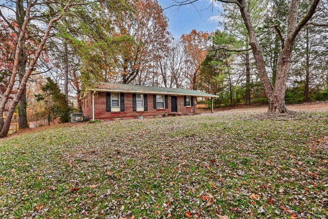 Building Photo - Cozy 3BR Home with Spacious Yard & XL Carport!