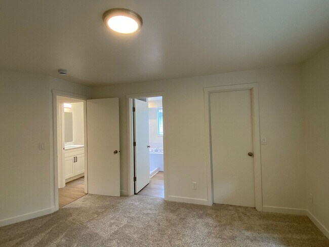 Building Photo - Stylishly Renovated Home with Private Back...