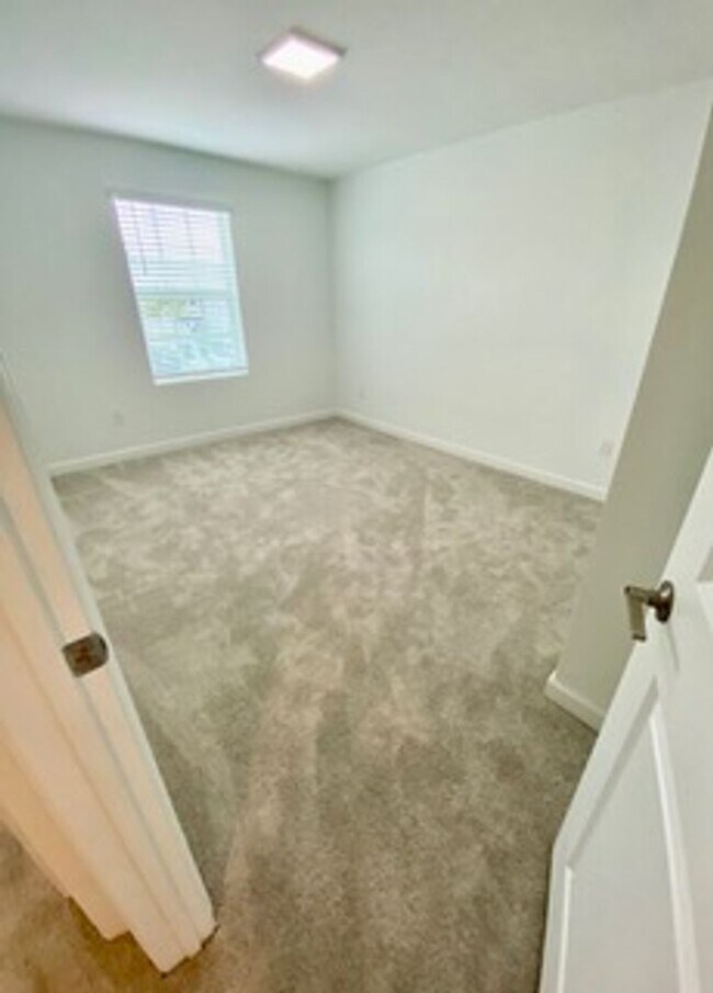 Building Photo - Brand new Townhome centrally located in La...