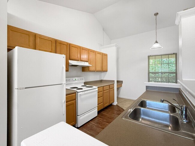 Building Photo - Luxe 1-Bedroom Haven: Serene Lakeside Livi...