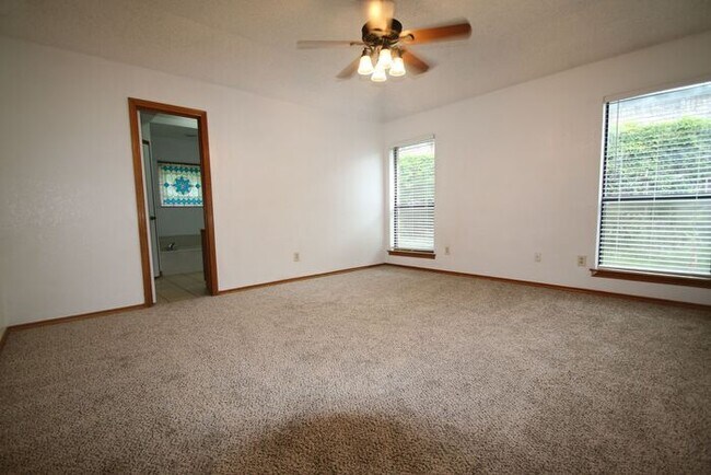 Building Photo - Corner Lot Charmer Off Chapel Creek | 4BR/2BA with Fireplace, Garden Tub & Fenced Backyard