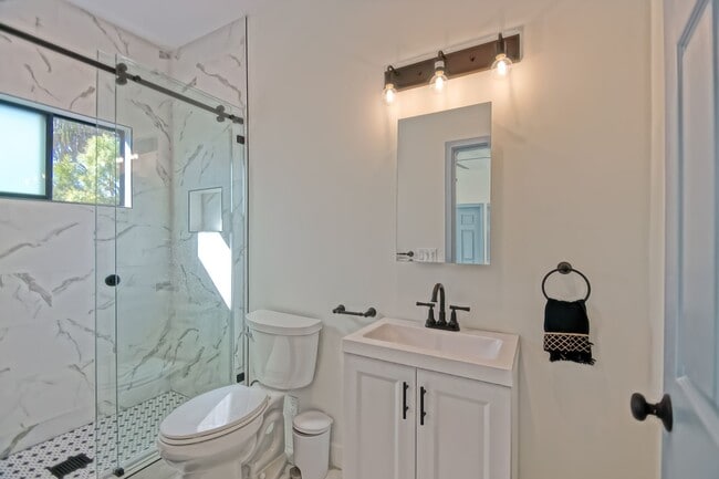 Building Photo - Beautifully Remodeled, Bright & Modern 4BR3BA Home w/ 2BR1BA Guest House On Sprawling Corner Lot ...