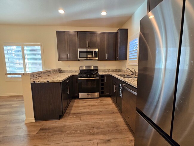 Building Photo - Beautiful, Newly-Built, Townhouse w/A/C & ...